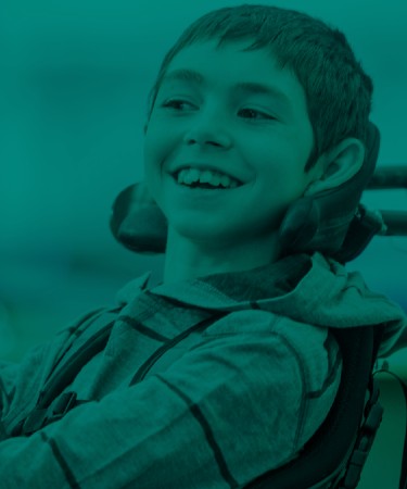Dreng med funktionsnedsættelse